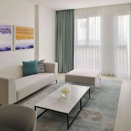Moevenpick Hotel & Apartments Ghala Muscat Exterior photo A living room