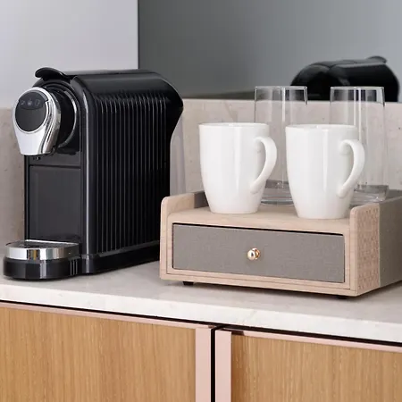 Moevenpick Hotel & Apartments Ghala Muscat Exterior photo A Nespresso coffee machine