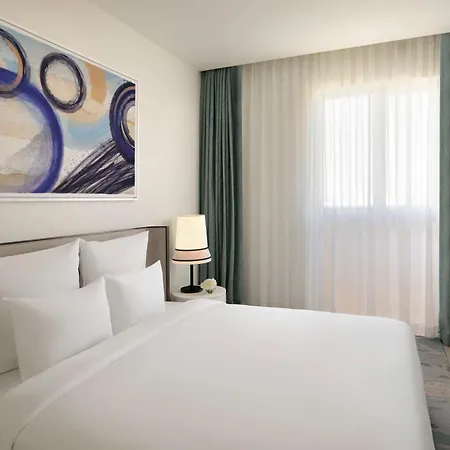 Moevenpick Hotel & Apartments Ghala Muscat Exterior photo A bedroom at the hotel