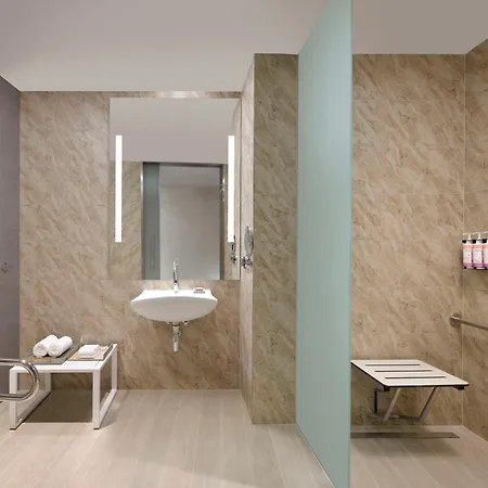 Moevenpick Hotel & Apartments Ghala Muscat Exterior photo A wet room