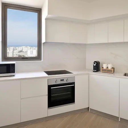 Moevenpick Hotel & Apartments Ghala Muscat Exterior photo A typical kitchen in a student apartment