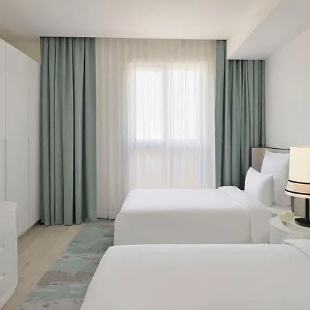 Moevenpick Hotel & Apartments Ghala Muscat Exterior photo A typical bedroom at the hotel