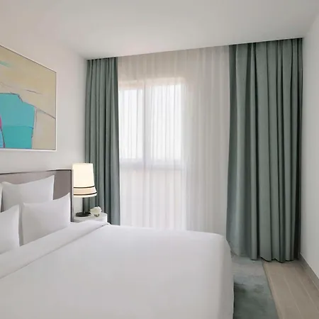 Moevenpick Hotel & Apartments Ghala Muscat Exterior photo A bedroom at the hotel