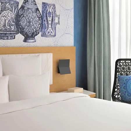Moevenpick Hotel & Apartments Ghala Muscat Exterior photo A room at the hotel