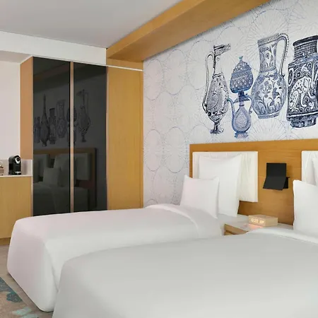 Moevenpick Hotel & Apartments Ghala Muscat Exterior photo A room at the hotel