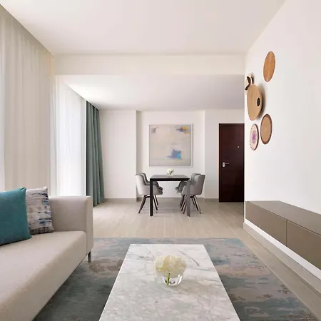Moevenpick Hotel & Apartments Ghala Muscat Exterior photo A living room at the hotel